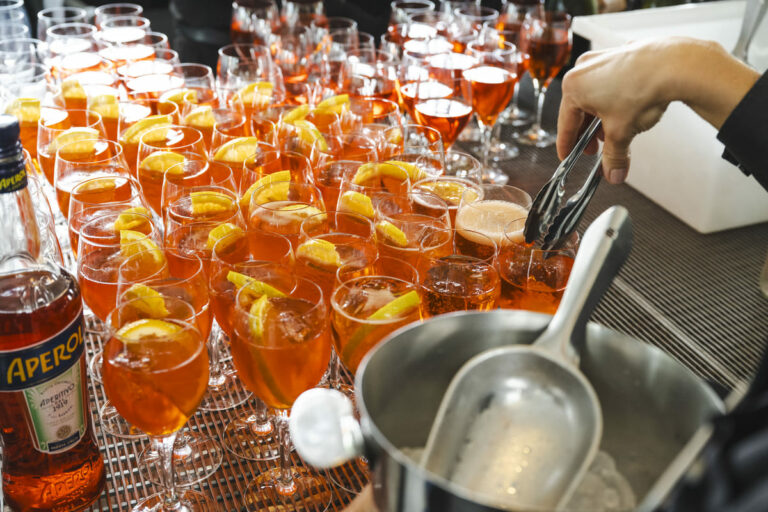 Glasses of Aperol Spritz cocktails are shown at an Australian Turf Club venue.