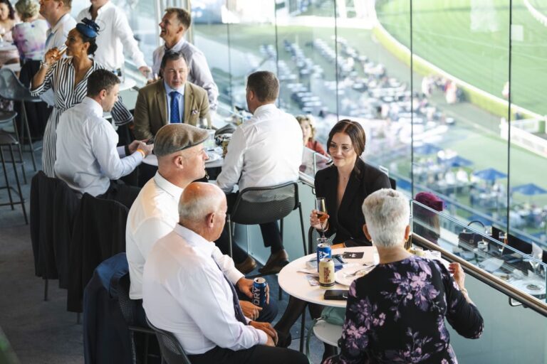 Racegoers sit in the Panoramas restaurant at Royal Randwick racecourse.