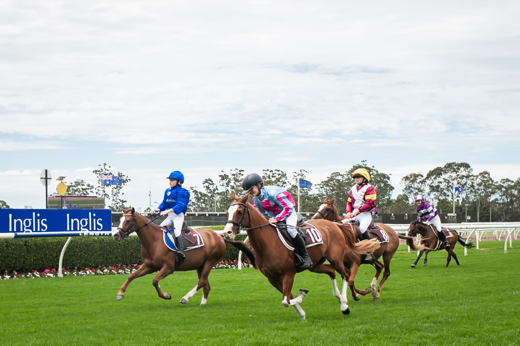 Children compete in a pony race at an Australia day meeting at Warwick Farm.