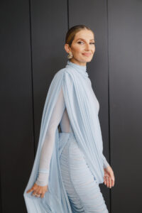 Racing influencer Kate Waterhouse poses for a photo.