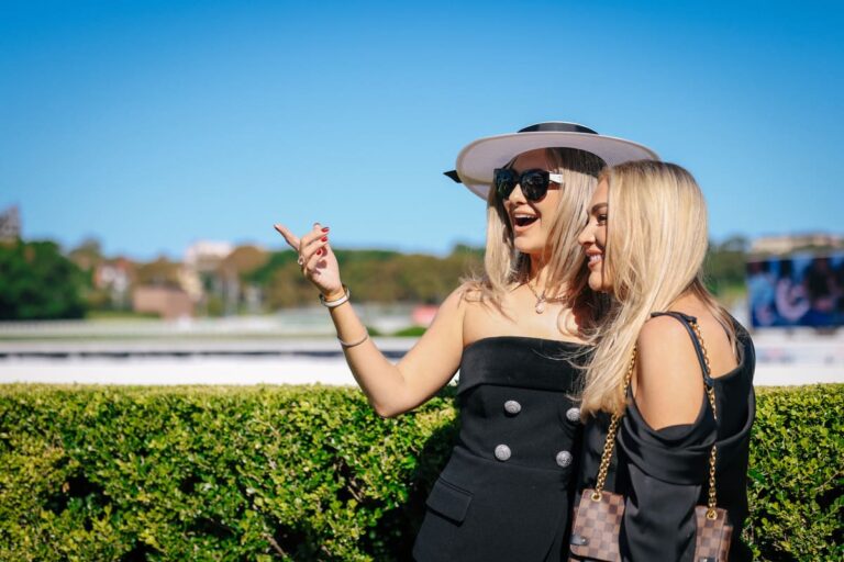 Two women socialise trackside at Royal Randwick.